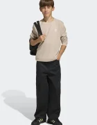 adidas Originals Детски панталон в черно с изчистен дизайн KC7033