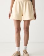 adidas Originals къс панталон тип анцуг дамски от памук Essentials жълт с висока талия KT4727