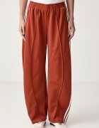adidas Originals спортен панталон дамски Firebird Barrel оранжев със стандартна талия LF1062
