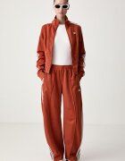 adidas Originals спортен панталон дамски Firebird Barrel оранжев със стандартна талия LF1062