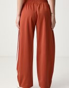 adidas Originals спортен панталон дамски Firebird Barrel оранжев със стандартна талия LF1062