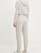 adidas Спортен панталон Essentials в бежово с изчистен дизайн JC8305