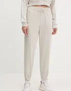 adidas Спортен панталон Essentials в бежово с изчистен дизайн JC8305