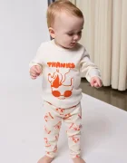 Bobo Choses Бебешка памучна блуза с дълъг ръкав Rolling dog