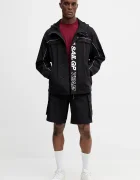 CALVIN KLEIN JEANS Памучна тениска в бордо с апликация LV04RC856G