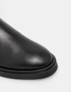 CALVIN KLEIN Кожени ботуши KNEE BOOT W/ METAL LOGO в черно с равна подметка HW0HW02665