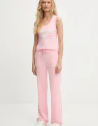 Juicy Couture Спортен панталон DEL RAY POCKETED PANT в розово с изчистен дизайн JCAP180