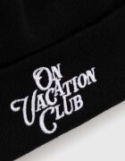 On Vacation Вълнена шапка в черно от плътен трикотаж от вълна