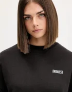 Puma Памучен суичър x ROSÉ в черно с изчистен дизайн 633803