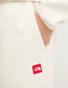 The North Face Спортен панталон Redbox в бежово с изчистен дизайн NF0A8EG2QLI1