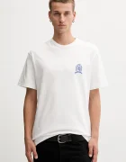Tommy Jeans Памучна тениска в бежово с десен DM0DM21986