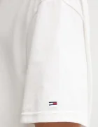 Tommy Jeans Памучна тениска в бежово с десен DM0DM21986