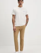 Tommy Jeans Панталон мъжки в зелено с кройка по тялото DM0DM22404