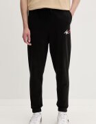 Tommy Jeans спортен панталон мъжки от памук черен със стандартна талия DM0DM23903