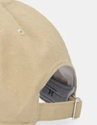 Under Armour Памучна шапка с козирка в зелено 6007147