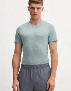 Under Armour Тениска за бягане Seamless Stride в зелено с десен 1375692