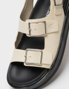 CALVIN KLEIN JEANS Кожени сандали с токи и равна подметка Слонова кост