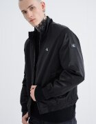 CALVIN KLEIN JEANS Яке с цип и джобове Черен