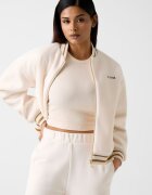 GUESS Къс фитнес топ с рипс Крем