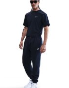 Nike Спортен панталон с връзка и джобове Тъмносин
