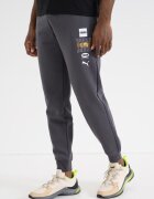 Puma Скосен спортен панталон Ess Holiday с лого Въглен сиво