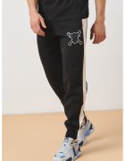 Puma Спортен панталон X One Piece с контрастни ленти встрани - Черен/Мръснобял
