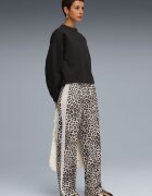 Puma Свободен спортен панталон T7 Leo Luxe
