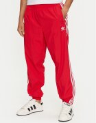 adidas Долнище анцуг Adicolor Woven Firebird IT2498 Червен Regular Fit