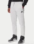 adidas Долнище анцуг Essentials Feelcozy Fleece JE3819 Светлосив Regular Fit