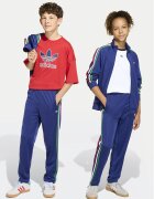 adidas Долнище анцуг Firebird KC9503 Син Regular Fit