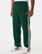 adidas Долнище анцуг Firebird KD8317 Зелен Loose Fit