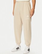 adidas Долнище анцуг Seasonal Essentials Collegiate French Terry Cuffed KF4265 Regular Fit