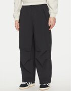 adidas Текстилни панталони Premium Essentials Utility Parachute JD2111 Черен Loose Fit