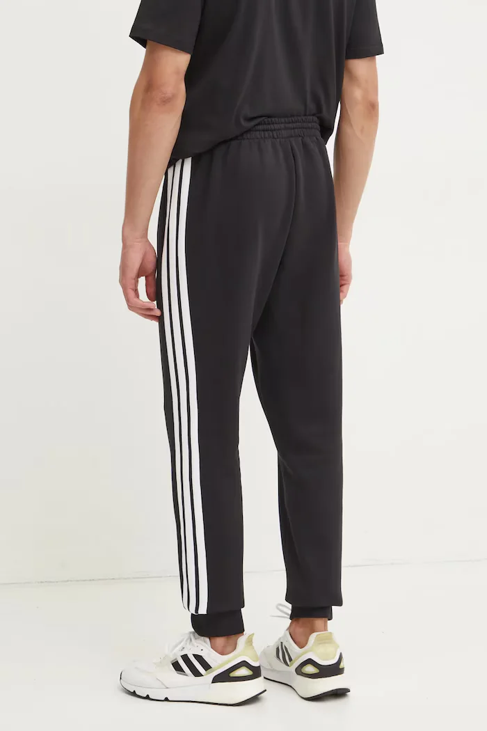 adidas Спортен панталон Essentials в черно с десен JD1861