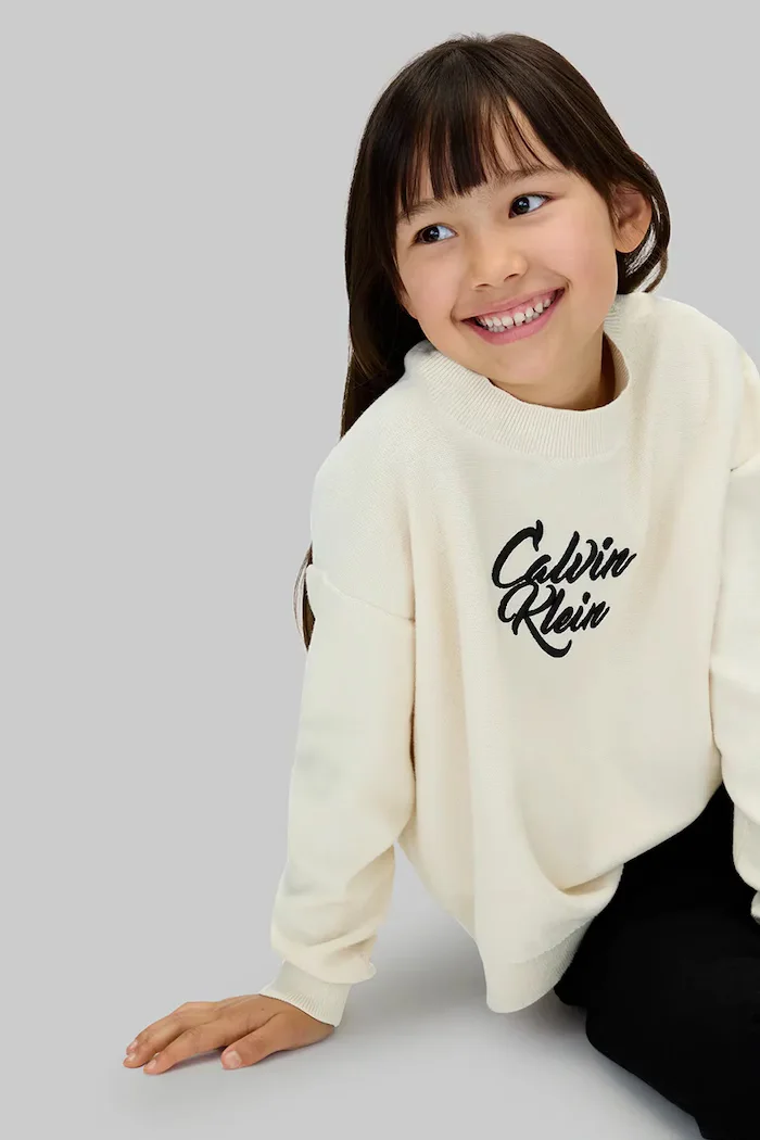 CALVIN KLEIN JEANS Детски пуловер в бежово от лека материя IG0IG03026