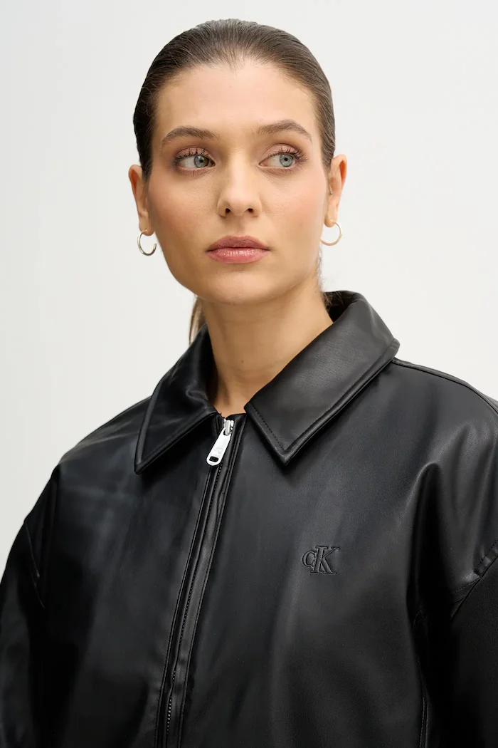 CALVIN KLEIN JEANS Яке в черно преходен модел с уголемена кройка LV047E507G