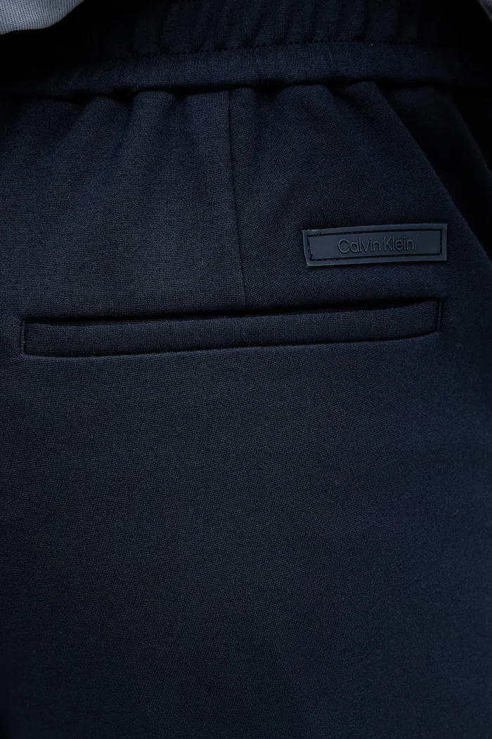 CALVIN KLEIN Панталон мъжки в тъмносиньо с кройка по тялото LV04LE613G