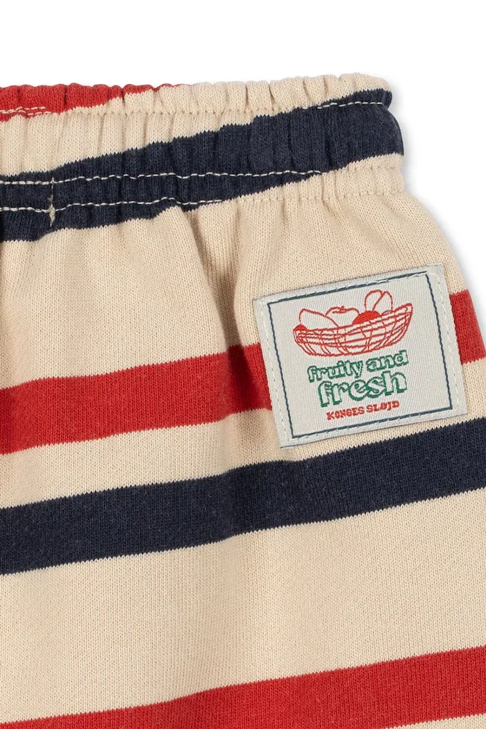 Konges Sløjd спортен панталон за деца от памук LOU STRIPE SWEAT PANTS GOTS бежов със стандартна талия KS106117