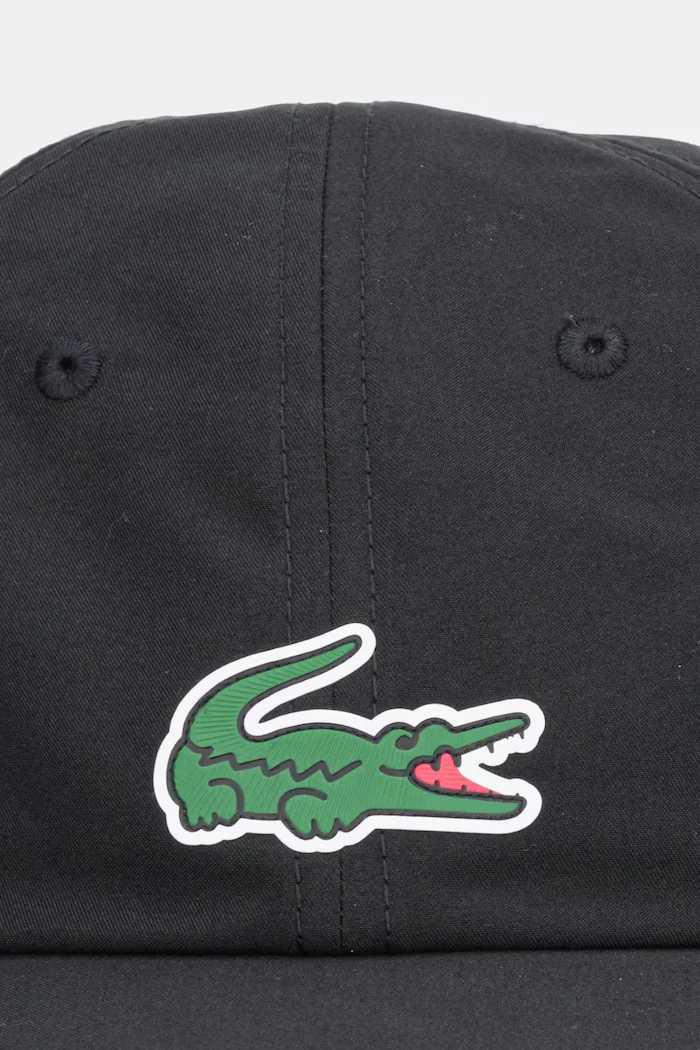 Lacoste Шапка с козирка в лилаво с апликация RK2450