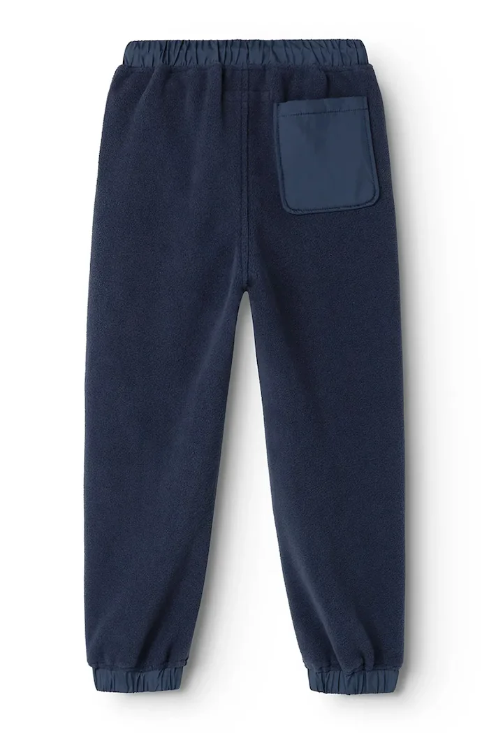 Liewood спортен панталон за деца Wendy Fleece Pants тъмносин със стандартна талия LW20905
