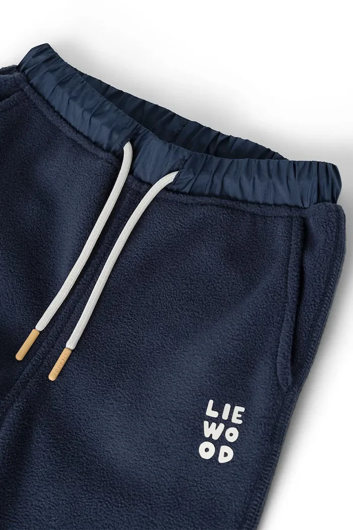 Liewood спортен панталон за деца Wendy Fleece Pants тъмносин със стандартна талия LW20905