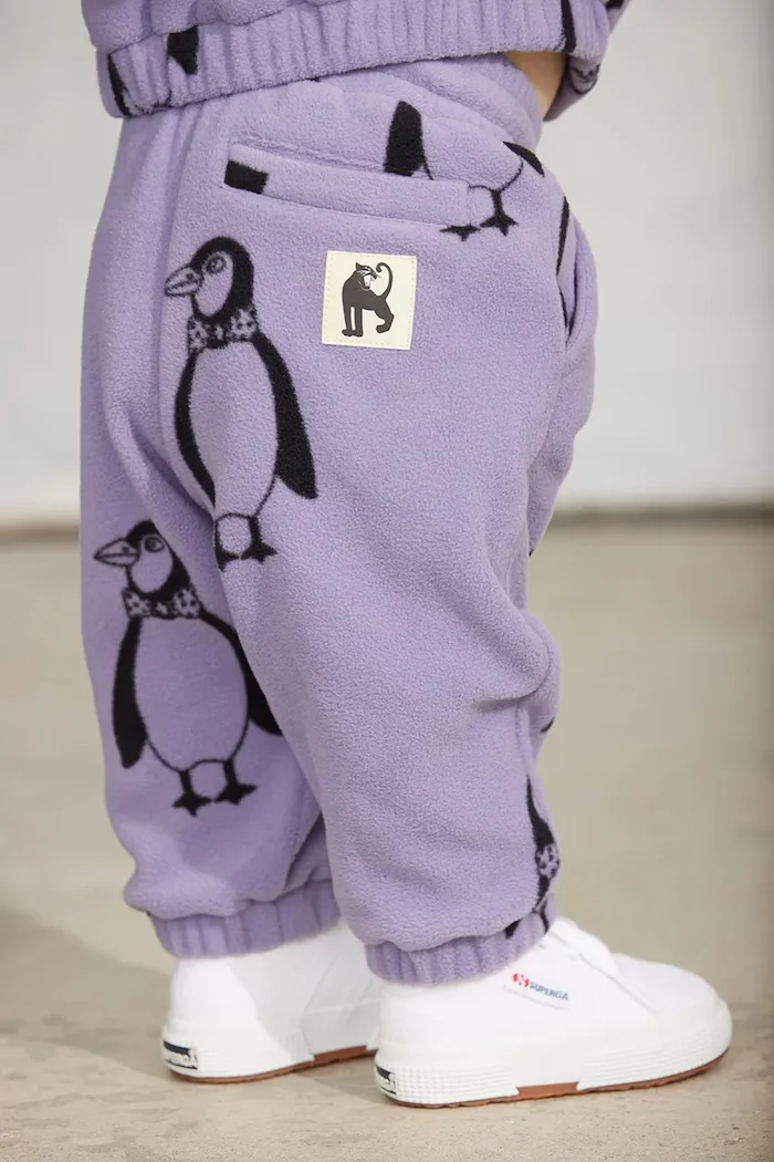MINI RODINI панталон джогър за деца от полар Penguin виолетов 11000365