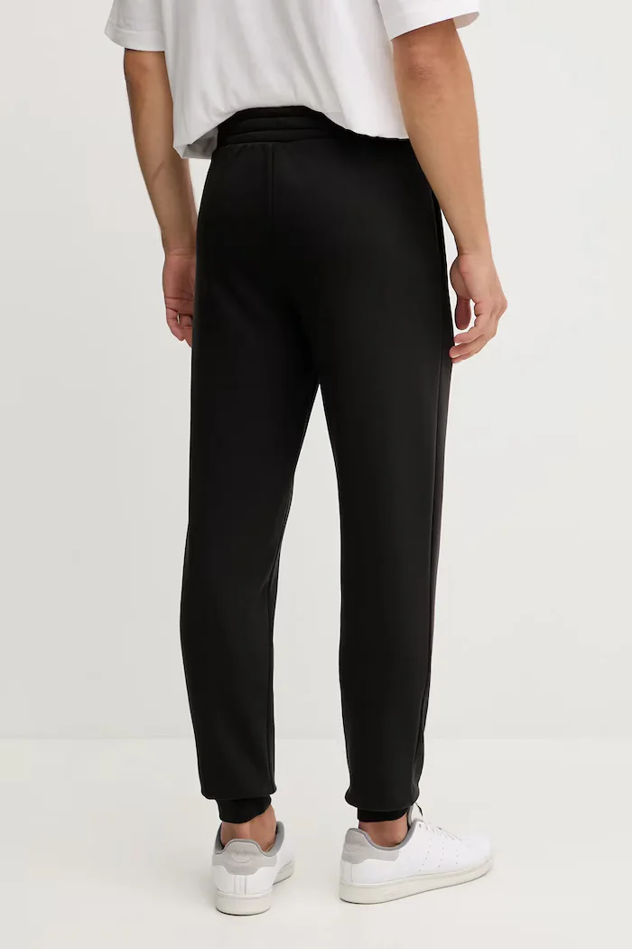 Puma Спортен панталон Essential Sweatpants мъжки в черно с изчистен дизайн 682606