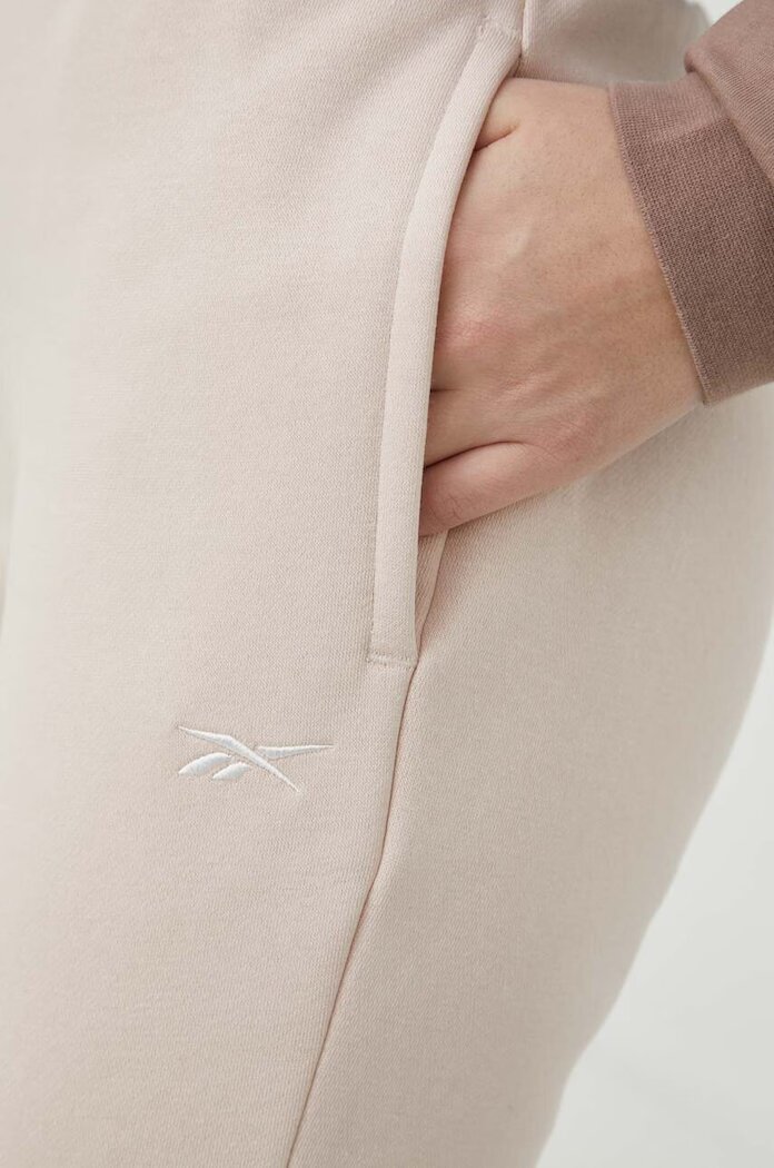 Reebok Спортен панталон в розово с изчистен дизайн