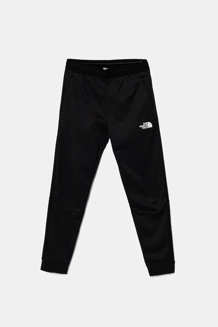 The North Face Детски спортен панталон MOUNTAIN ATHLETICS JOGGERS в черно с принт NF0A89HWKY41