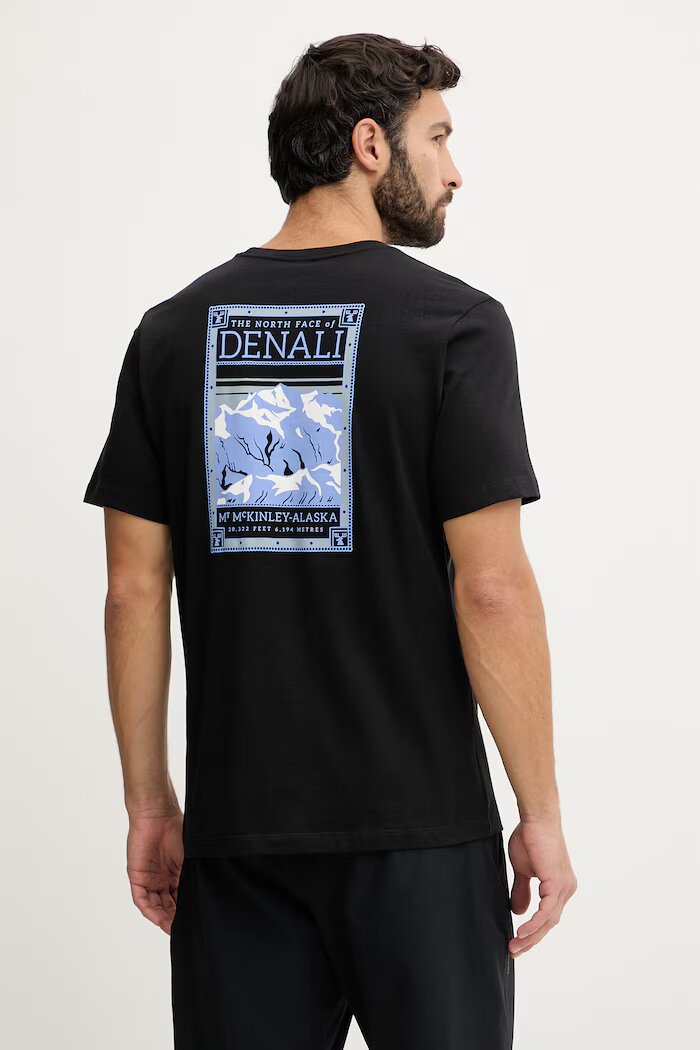 The North Face Памучна тениска GRAPHIC в черно с принт NF0A8GUWJK31
