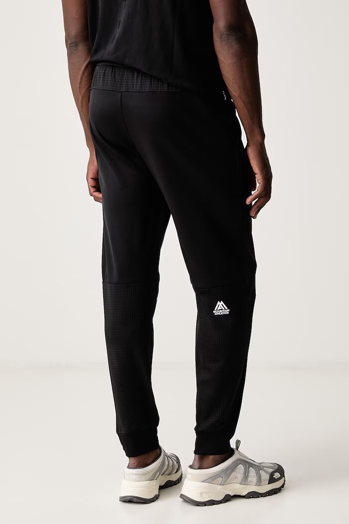 The North Face панталон за трениране мъжки MOUNTAIN ATHLETICS черен NF0A8J8DJK31