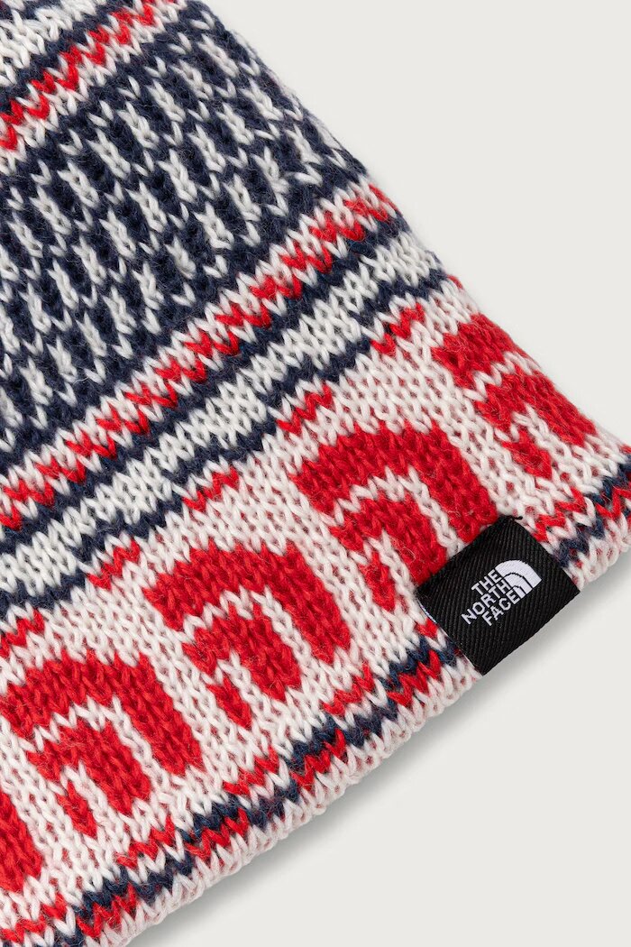 The North Face шапка с помпон Cabin Ski Tuke червена NF0A8CH0IKH1