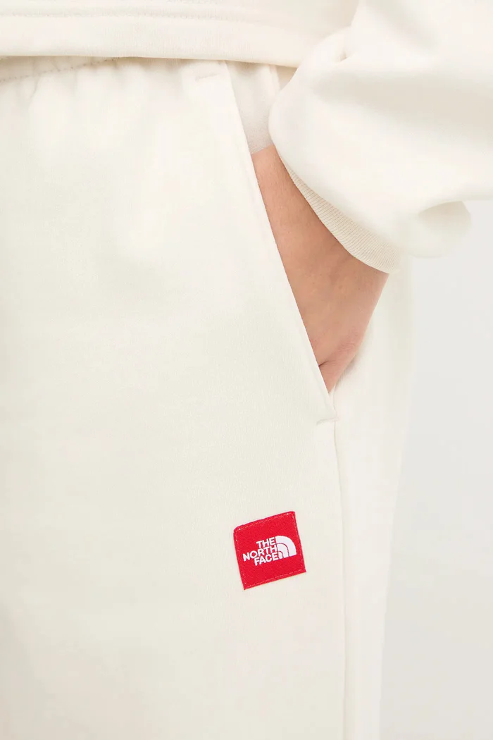 The North Face Спортен панталон Redbox в бежово с изчистен дизайн NF0A8EG2QLI1