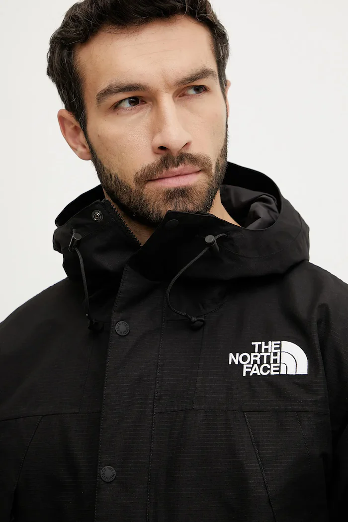 The North Face Яке Dryvent Mono Mountain в черно преходен модел с уголемена кройка NF0A88XFJK31